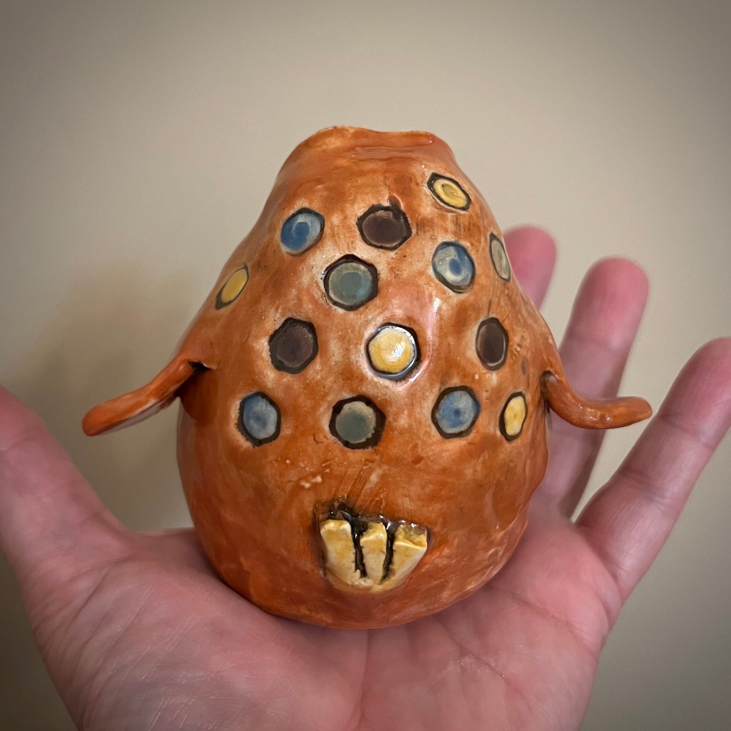 Shake Me Baby Orange Bird Cerami Rattle