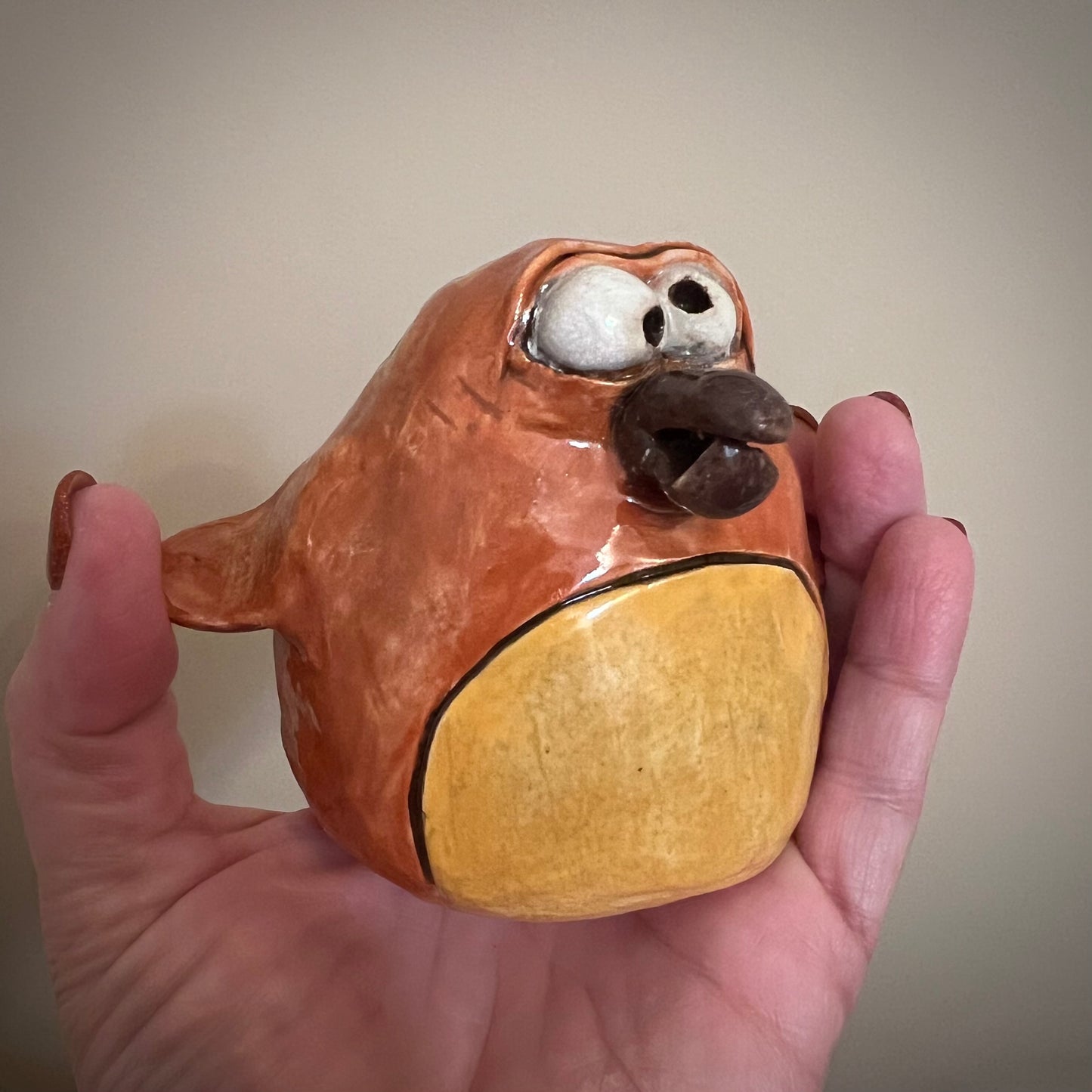 Shake Me Baby Orange Bird Cerami Rattle